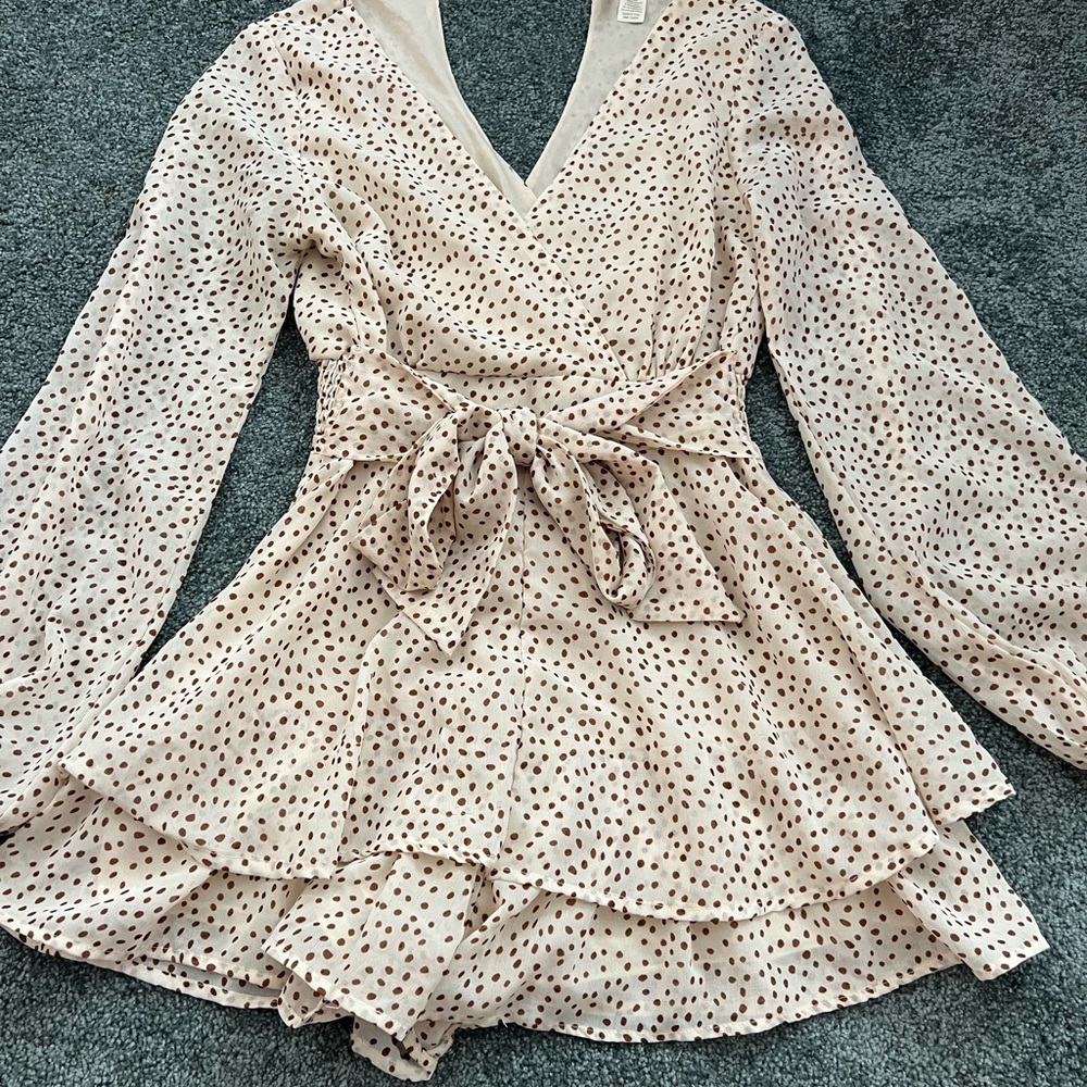 Super cute boutique romper! Size small.